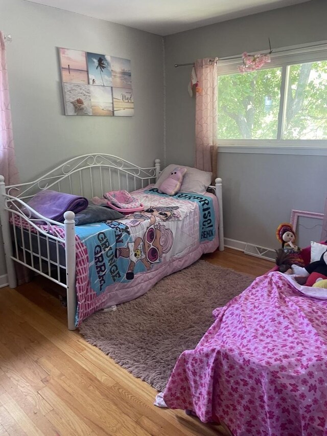 549 E Lincoln St Unit 549, Mount Prospect, IL 60056 - bedroom with wood finished floors