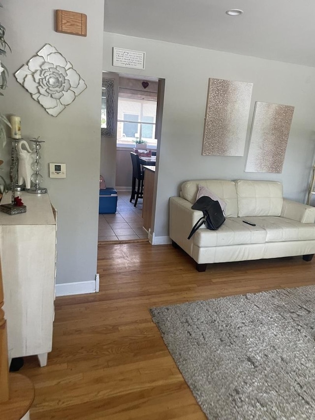 549 E Lincoln St Unit 549, Mount Prospect, IL 60056 - living area with wood finished floors and baseboards