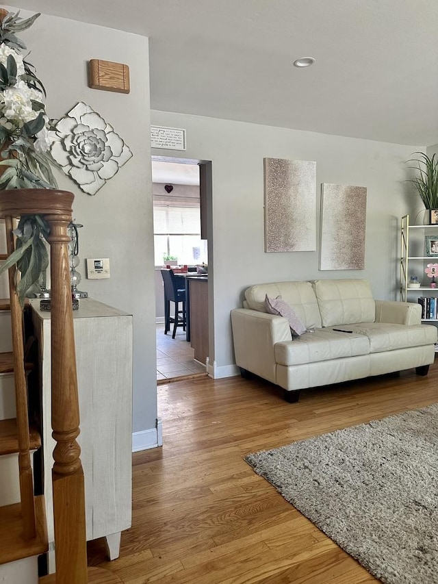 549 E Lincoln St Unit 549, Mount Prospect, IL 60056 - living area with wood finished floors, baseboards, and recessed lighting