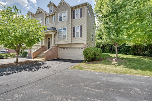 3355 Kentshire Cir, Aurora, IL 60504 - multi unit property with brick siding, driveway, an attached garage, and a front yard