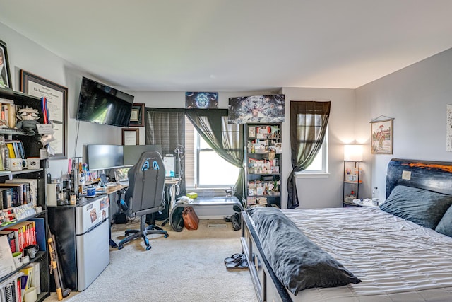 3355 Kentshire Cir, Aurora, IL 60504 - bedroom featuring multiple windows, carpet, freestanding refrigerator, and an office area
