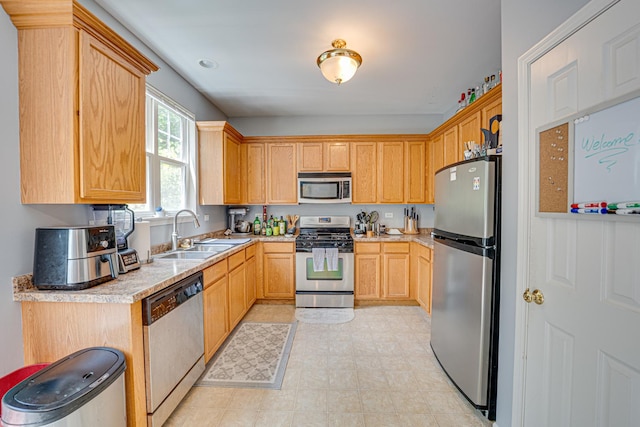 3355 Kentshire Cir, Aurora, IL 60504 - kitchen with appliances with stainless steel finishes, light countertops, light brown cabinets, and light flooring