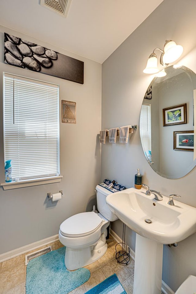 3355 Kentshire Cir, Aurora, IL 60504 - half bathroom featuring tile patterned floors and plenty of natural light