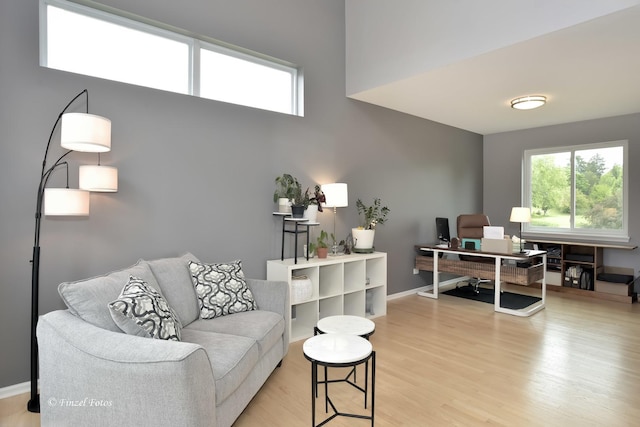 2012 Spring Creek Ln, Mchenry, IL 60050 - living area featuring a desk, light wood-type flooring, and baseboards