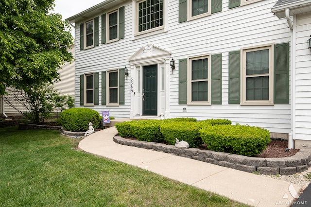 3365 Charlemaine Dr, Aurora, IL 60504 - property entrance with a lawn