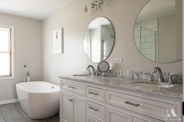 3365 Charlemaine Dr, Aurora, IL 60504 - bathroom with double vanity, plenty of natural light, a soaking tub, and tile patterned flooring