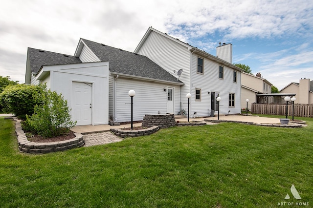 3365 Charlemaine Dr, Aurora, IL 60504 - back of house with a patio area, a chimney, and a shingled roof