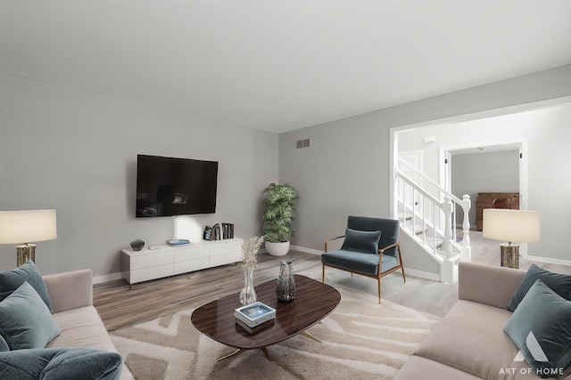 3365 Charlemaine Dr, Aurora, IL 60504 - living room with stairway, wood finished floors, and baseboards
