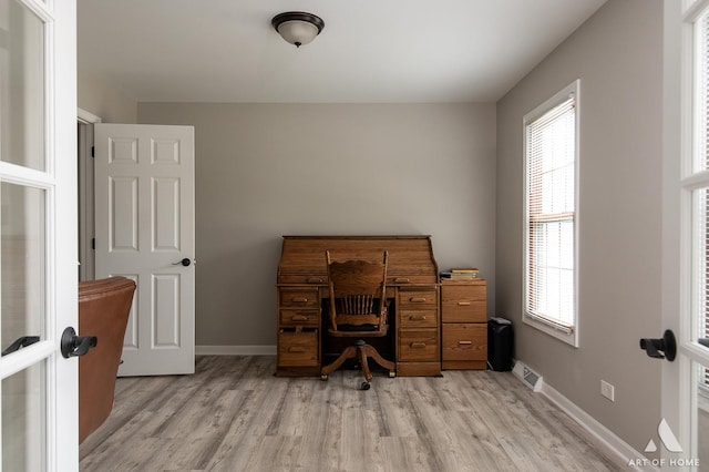 3365 Charlemaine Dr, Aurora, IL 60504 - office area with light wood-type flooring, healthy amount of natural light, and baseboards