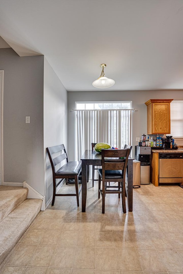 3379 Kentshire Cir, Aurora, IL 60504 - dining space featuring light tile patterned floors and stairs