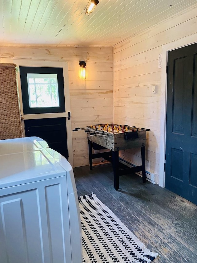 106 Dewey St, Harvard, IL 60033 - interior space with independent washer and dryer, dark wood-type flooring, wood walls, and wooden ceiling
