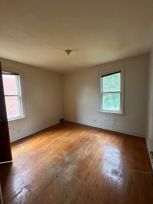 402 N NW Hwy, Park Ridge, IL 60068 - spare room featuring wood-type flooring and baseboards