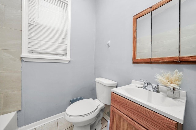 5014 S Paulina St, Chicago, IL 60609 - bathroom with vanity, toilet, tile patterned floors, baseboards, and a bathtub