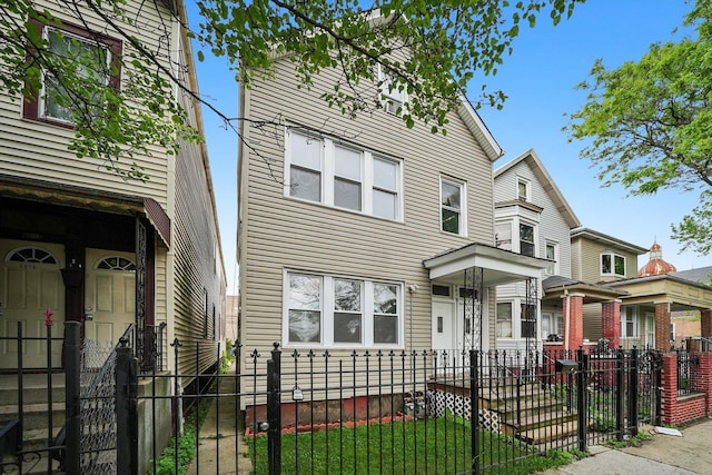 5014 S Paulina St, Chicago, IL 60609 - view of front of house with a fenced front yard and a gate