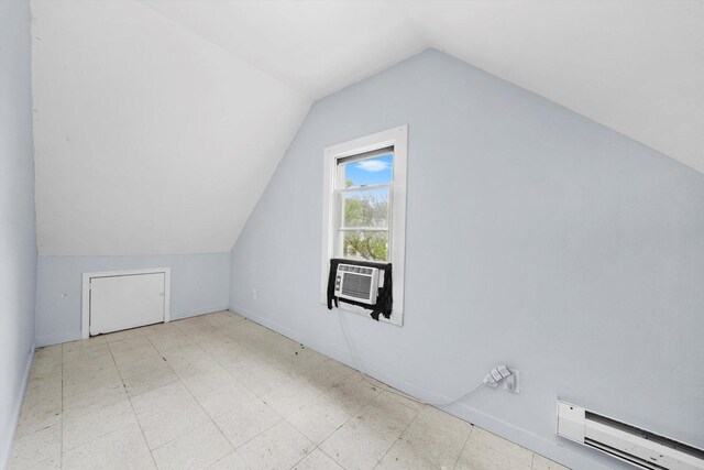 5014 S Paulina St, Chicago, IL 60609 - bonus room featuring baseboard heating, tile patterned floors, lofted ceiling, and cooling unit