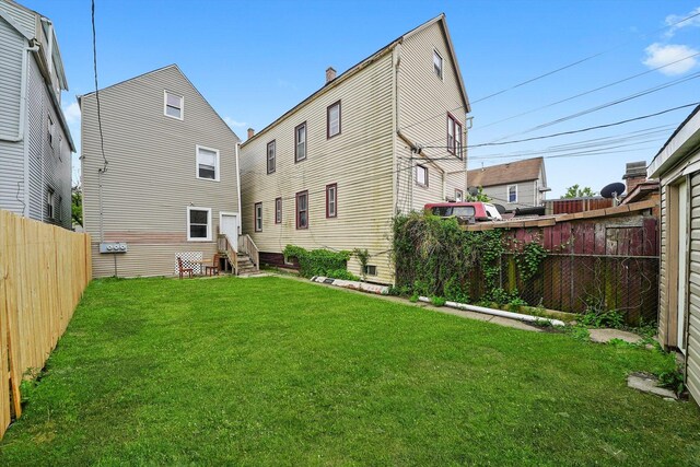 5014 S Paulina St, Chicago, IL 60609 - rear view of property featuring entry steps
