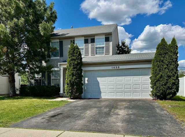 1458 Woodland Dr, South Elgin, IL 60177 - view of front of home with driveway and a front yard