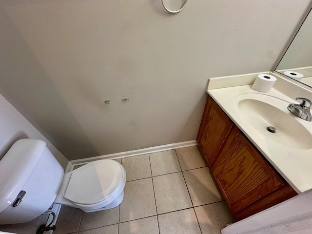 1458 Woodland Dr, South Elgin, IL 60177 - bathroom with vanity, toilet, tile patterned floors, and baseboards