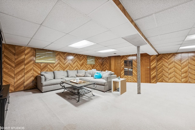 5513 Mulford St, Skokie, IL 60077 - carpeted living area featuring wood walls and a drop ceiling