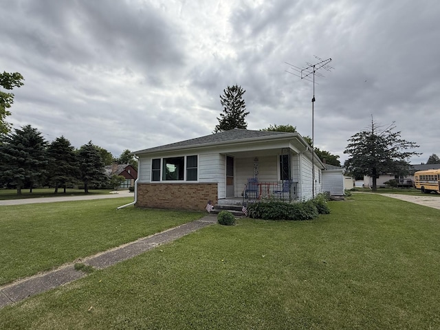 612 S 1st Ave, Forreston, IL 61030 - bungalow with covered porch and a front lawn