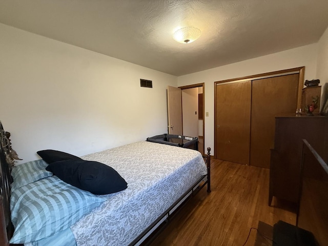 612 S 1st Ave, Forreston, IL 61030 - bedroom with wood finished floors and a closet