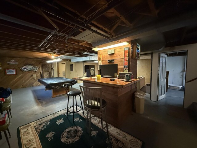612 S 1st Ave, Forreston, IL 61030 - bar area with unfinished concrete flooring, wooden walls, and pool table