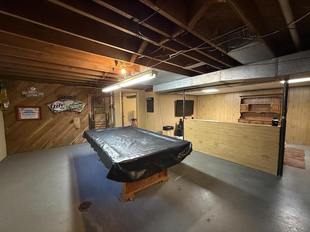 612 S 1st Ave, Forreston, IL 61030 - rec room with wood walls, concrete floors, and pool table