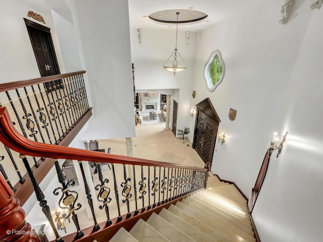 11315 77th St, Burr Ridge, IL 60527 - stairway featuring a high ceiling and baseboards