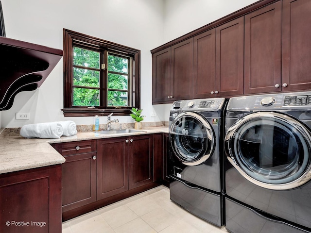 11315 77th St, Burr Ridge, IL 60527 - washroom featuring cabinet space, washing machine and clothes dryer, and light tile patterned floors