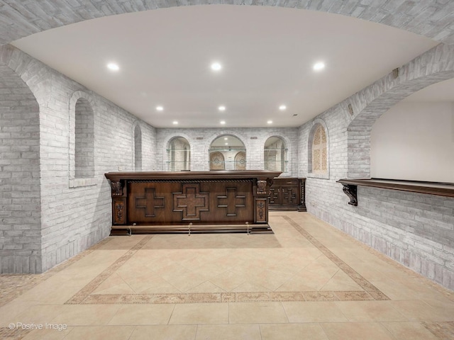 11315 77th St, Burr Ridge, IL 60527 - interior space featuring recessed lighting, arched walkways, and brick wall