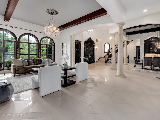 11315 77th St, Burr Ridge, IL 60527 - living room featuring decorative columns, beam ceiling, tile patterned floors, a chandelier, and arched walkways