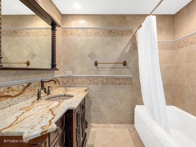 11315 77th St, Burr Ridge, IL 60527 - bathroom featuring tile walls, vanity, shower / tub combo, and tile patterned floors