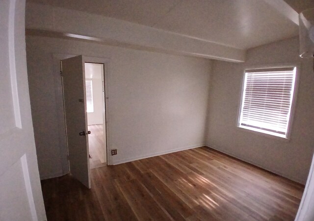 254 E 92nd St, Chicago, IL 60619 - spare room featuring wood finished floors