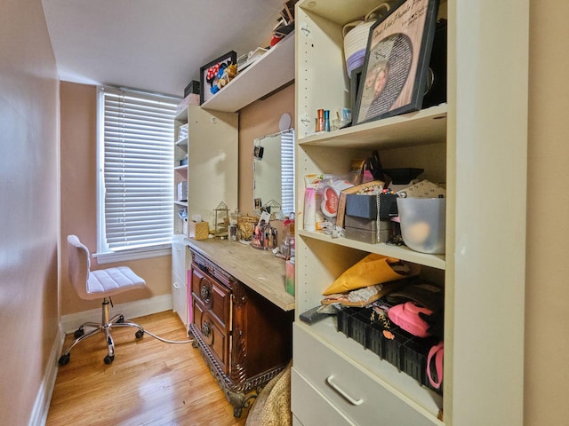 7314 W 58th St, Summit, IL 60501 - bathroom with wood finished floors, baseboards, and vanity