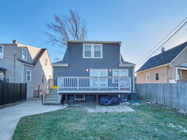 7314 W 58th St, Summit, IL 60501 - back of property with a deck, a patio, and central air condition unit