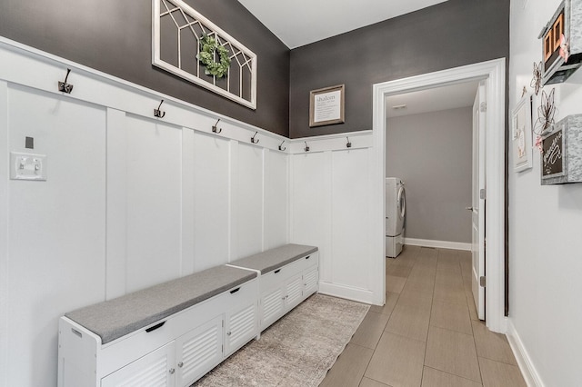 7166 Clubhouse Dr, Yorkville, IL 60560 - mudroom with separate washer and dryer, light tile patterned flooring, and baseboards