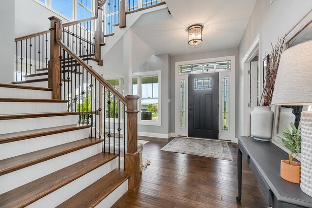 7166 Clubhouse Dr, Yorkville, IL 60560 - entrance foyer featuring baseboards, wood-type flooring, and stairway