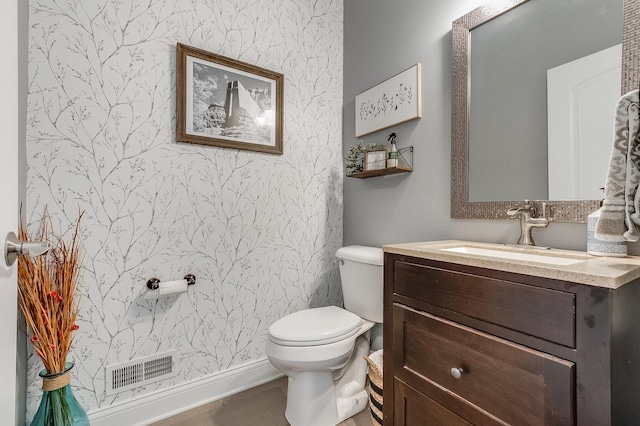 7166 Clubhouse Dr, Yorkville, IL 60560 - half bath featuring wallpapered walls, toilet, and vanity
