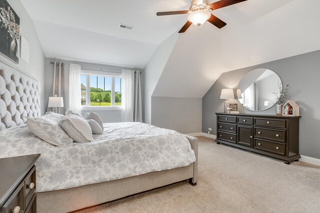 7166 Clubhouse Dr, Yorkville, IL 60560 - bedroom with vaulted ceiling, light colored carpet, baseboards, and ceiling fan