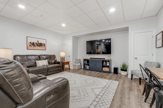 7166 Clubhouse Dr, Yorkville, IL 60560 - living room with wood finished floors, a paneled ceiling, baseboards, and recessed lighting