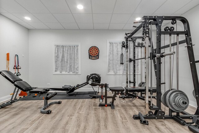 7166 Clubhouse Dr, Yorkville, IL 60560 - workout room with baseboards, wood finished floors, and a paneled ceiling