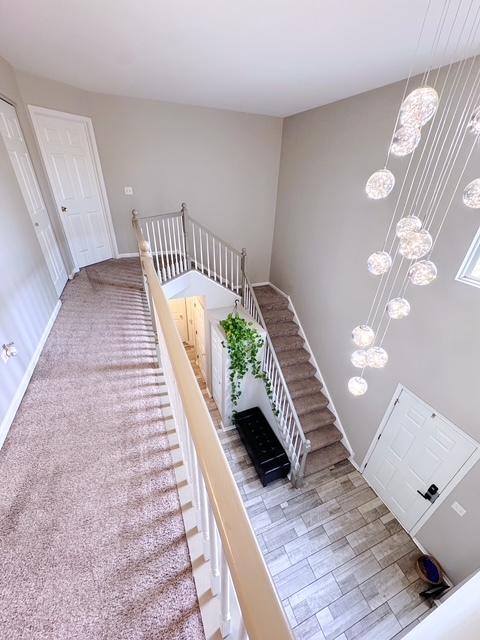 11319 Maplewood Dr, Plainfield, IL 60585 - stairs with baseboards