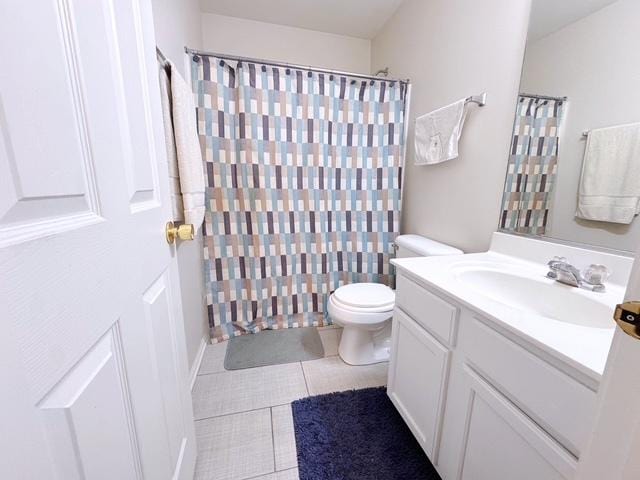 11319 Maplewood Dr, Plainfield, IL 60585 - bathroom with vanity, toilet, tile patterned flooring, and curtained shower