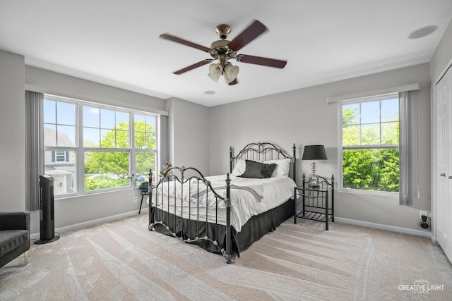 6N307 Whitmore Cir Unit A, Saint Charles, IL 60174 - carpeted bedroom featuring baseboards, multiple windows, and a ceiling fan