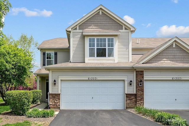 6N307 Whitmore Cir Unit A, Saint Charles, IL 60174 - craftsman-style house featuring asphalt driveway, stone siding, an attached garage, and roof with shingles