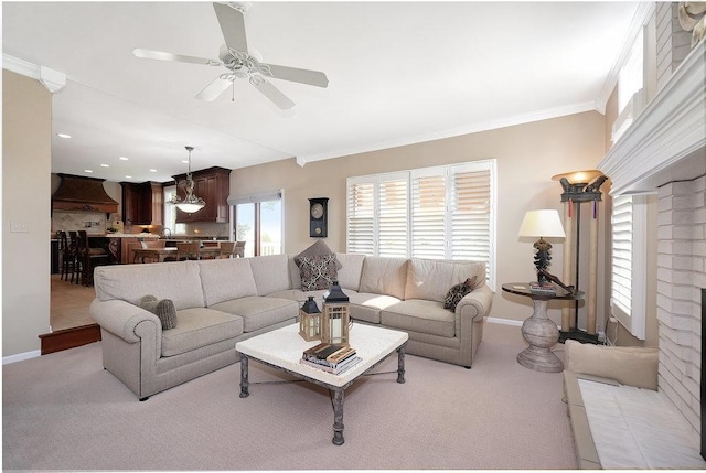 1537 Monarch Cir, Naperville, IL 60564 - carpeted living room with ceiling fan, crown molding, and baseboards