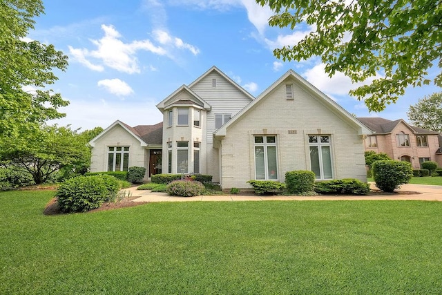 1537 Monarch Cir, Naperville, IL 60564 - view of front of house featuring brick siding and a front lawn