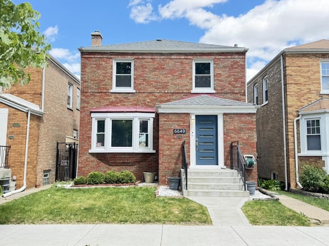 6649 S Karlov Ave, Chicago, IL 60629 - view of front facade with brick siding, a chimney, and entry steps
