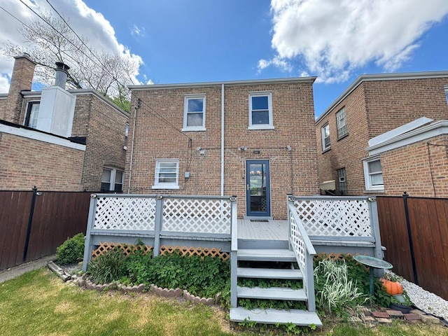 6649 S Karlov Ave, Chicago, IL 60629 - back of house with brick siding and a wooden deck