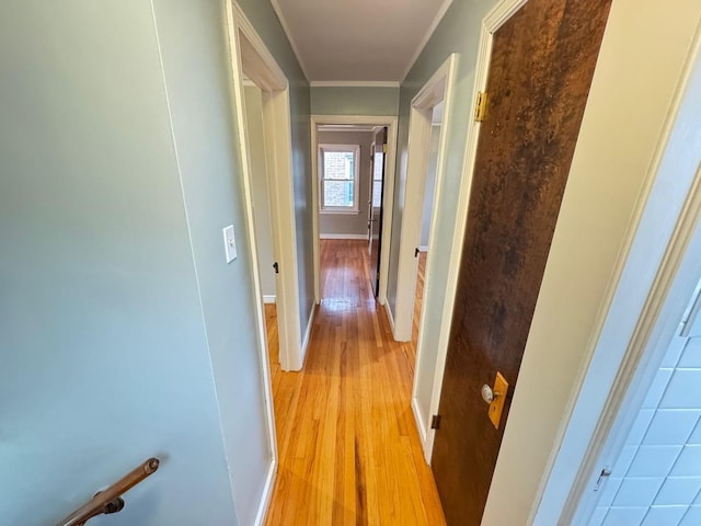 6649 S Karlov Ave, Chicago, IL 60629 - hall featuring light wood-type flooring, crown molding, and baseboards
